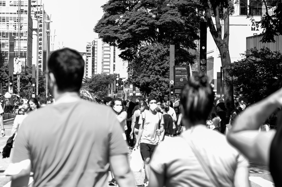 Diverse group of Brazilian adults talking in a supportive circle