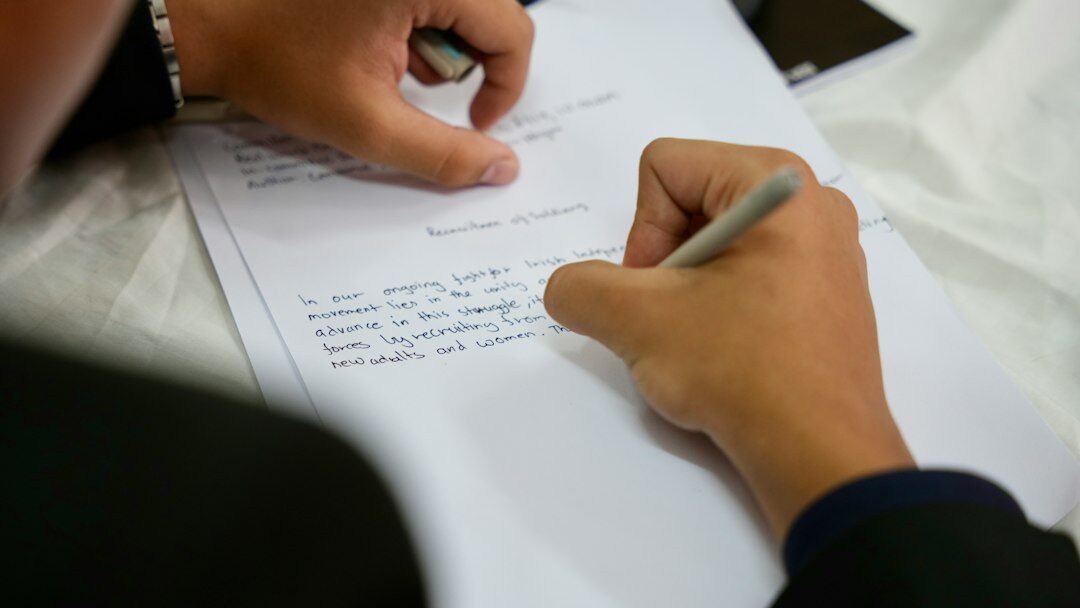 person writing goals